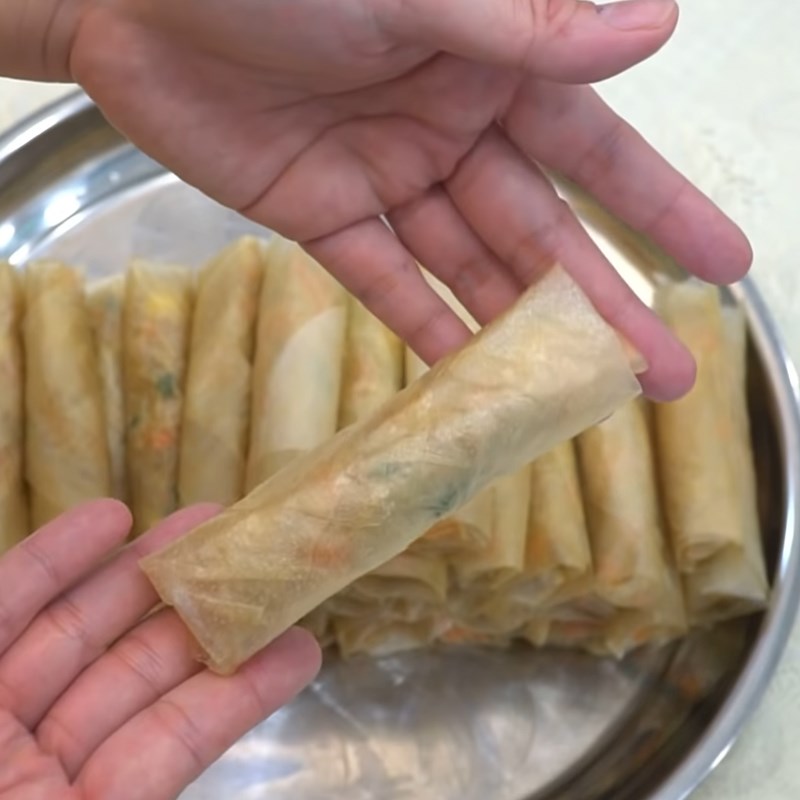 Step 5 Rolling the spring rolls Lotus seed spring rolls