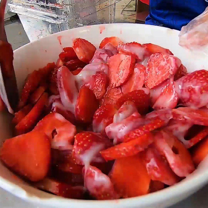 Step 2 Soak strawberries with condensed milk Strawberries soaked in condensed milk
