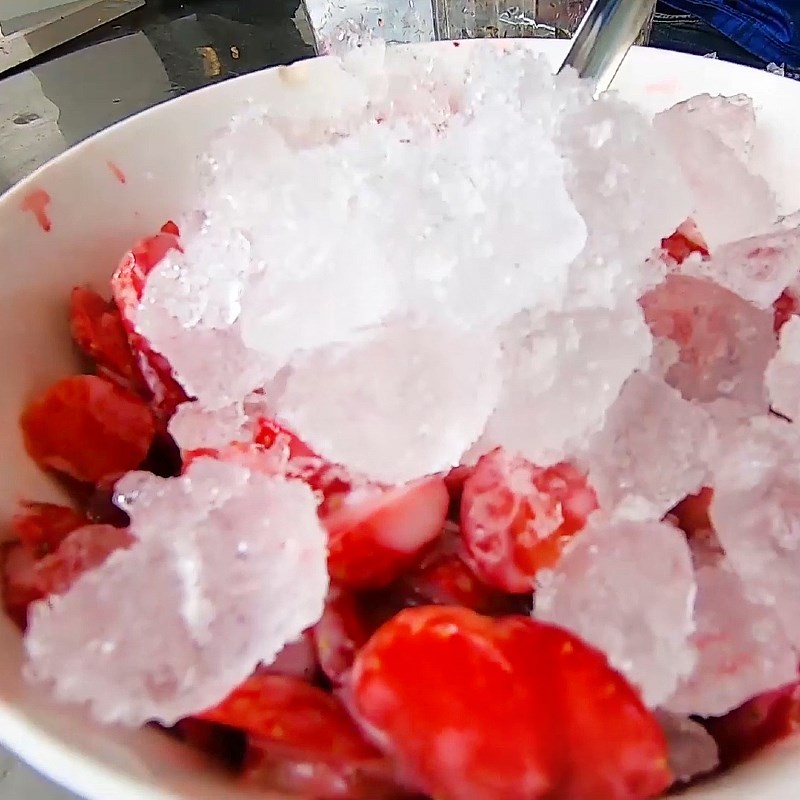 Step 2 Soak strawberries with condensed milk Strawberries soaked in condensed milk