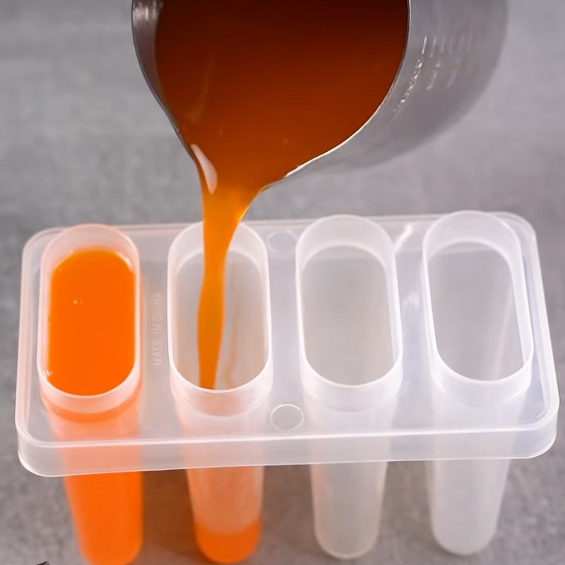 Step 4 Pouring and Cooling Orange Popsicle