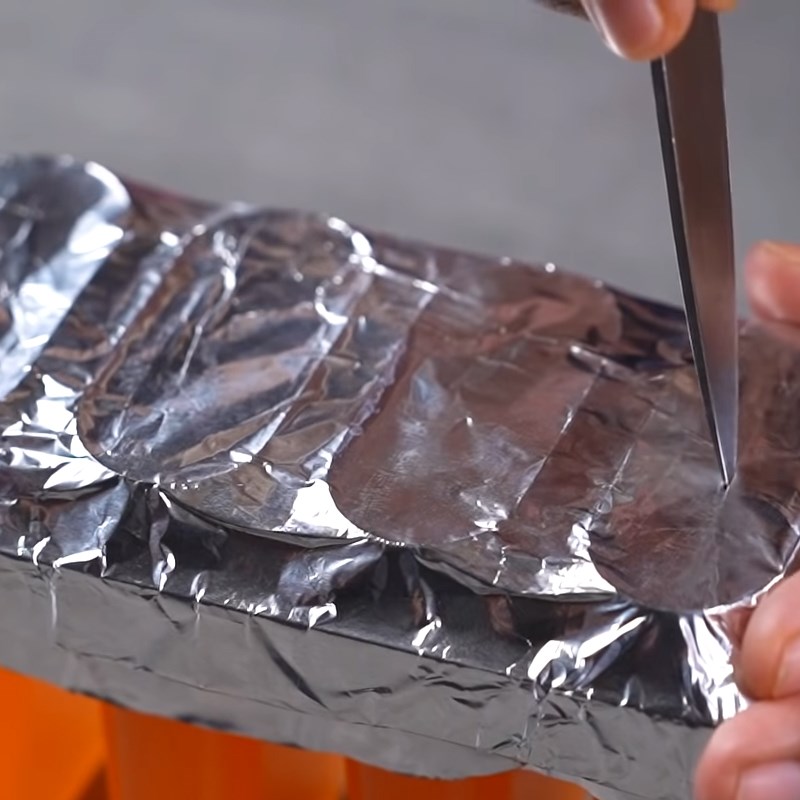 Step 4 Pouring and Cooling Orange Popsicle