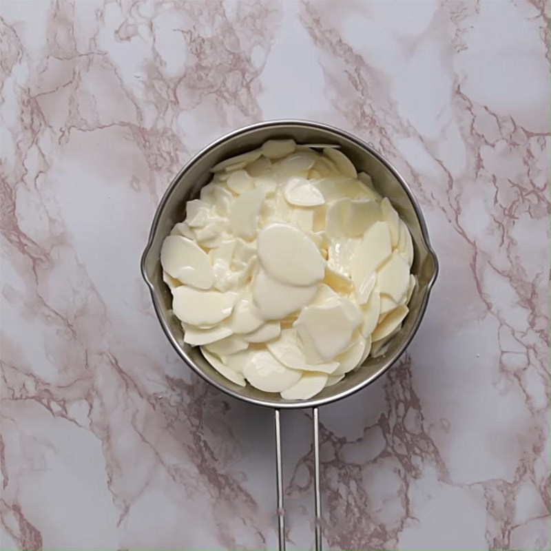 Step 1 Melting white chocolate Chocolate Blueberry Mousse Cake