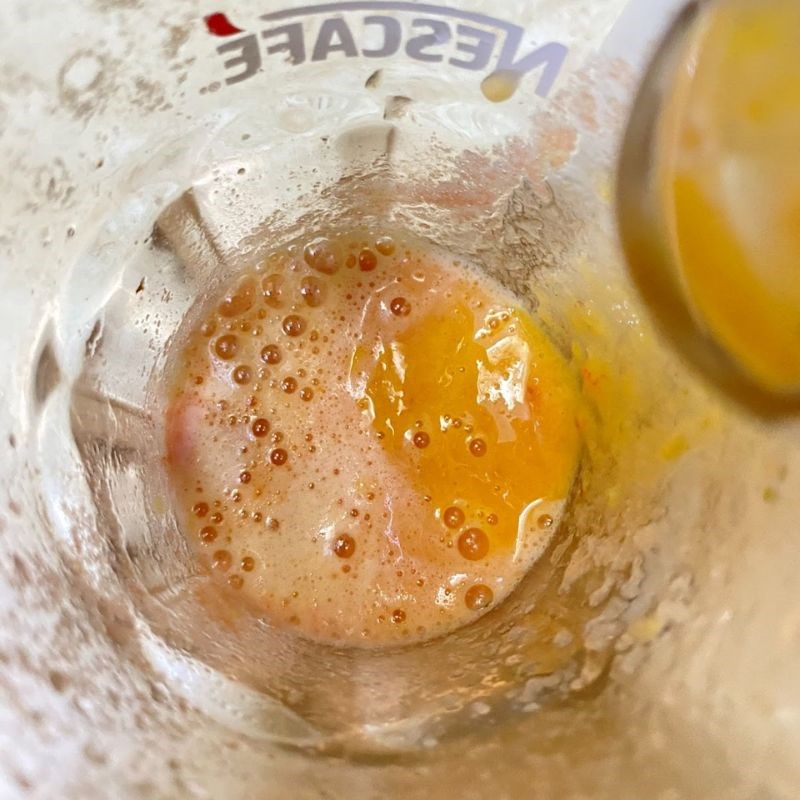 Step 2 Juicing the tomatoes and passion fruit Tomato Passion Fruit Juice
