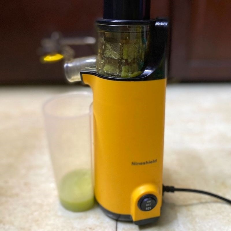 Step 2 Pressing the green mango and pineapple Pineapple green mango juice