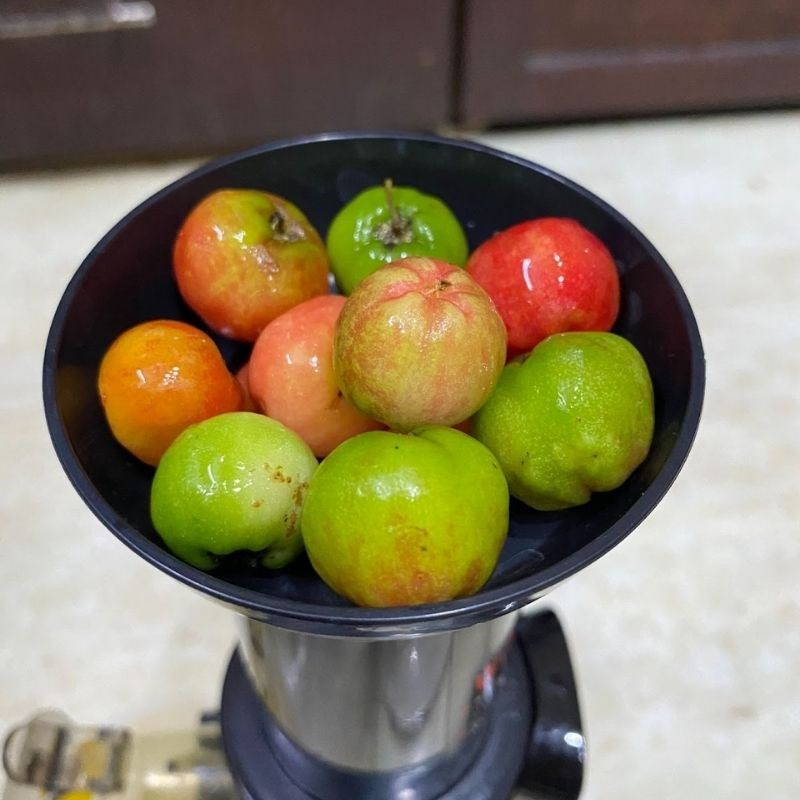 Step 2 Juice the starfruit and cherries for Starfruit and Cherry Juice