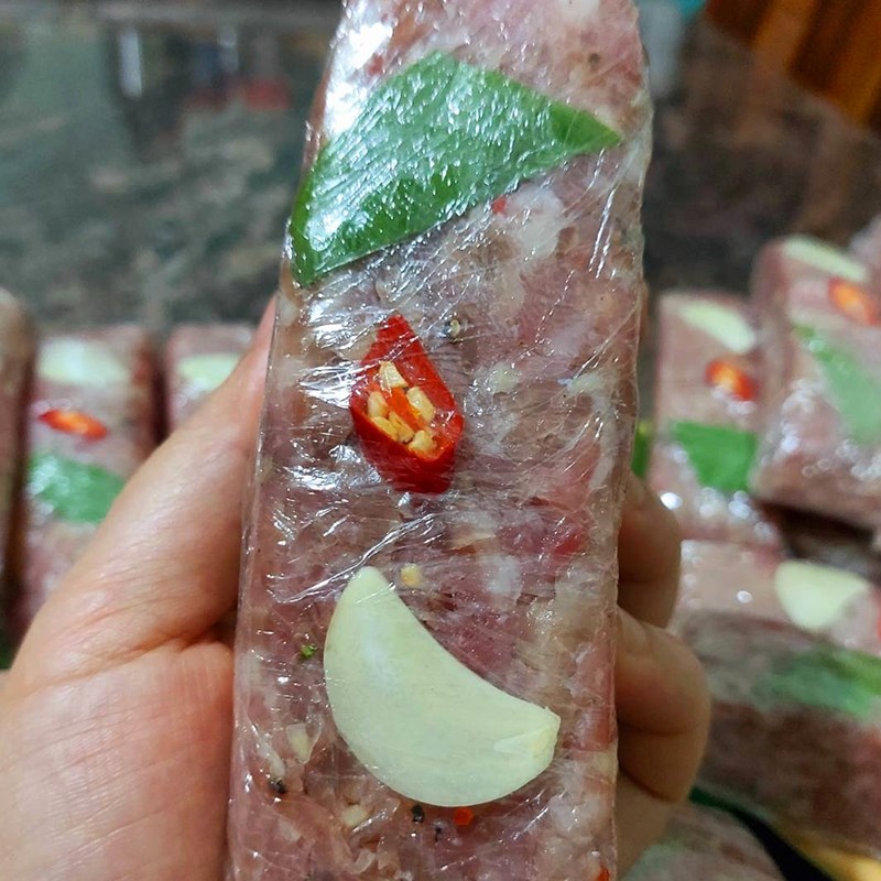 Step 6 Wrapping the nem Thanh Hoa sour nem without banana leaves