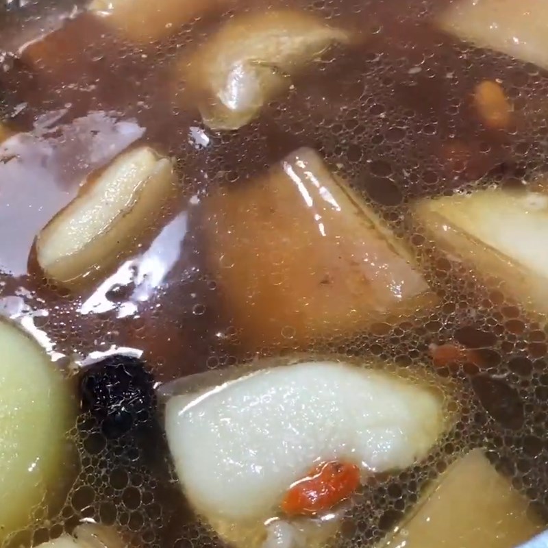 Step 3 Stew the dish Stewed pork tail with Chinese herbs