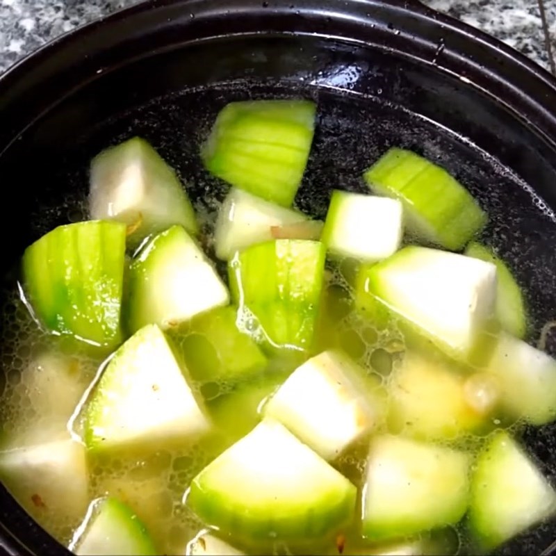Step 2 Steam salmon and boil zucchini for Salmon and zucchini porridge