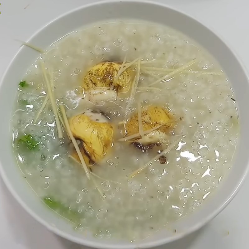 Step 4 Completion Duck egg porridge with mustard greens