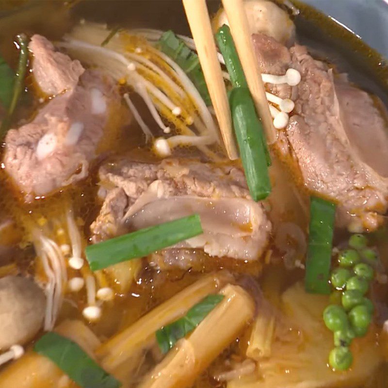 Step 5 Finishing the dish Sour spicy pork rib hot pot