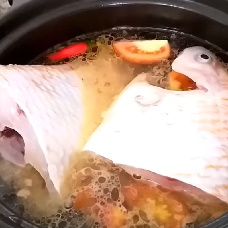 Step 4 Stew fish for Red tilapia stew