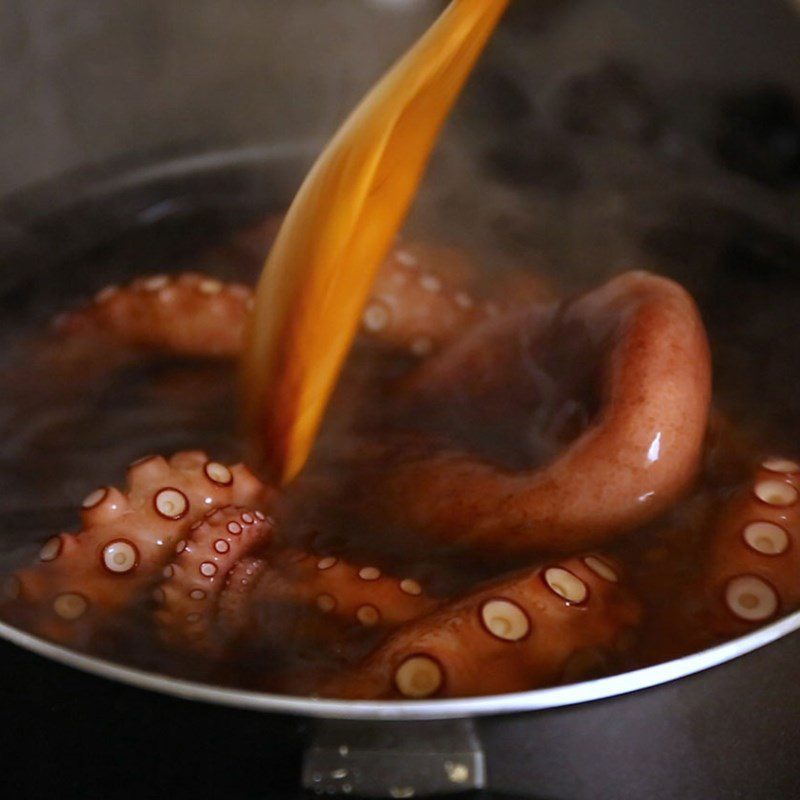 Step 2 Boil octopus Fried octopus with garlic butter