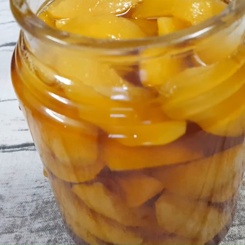 Step 2 Soak peaches in syrup