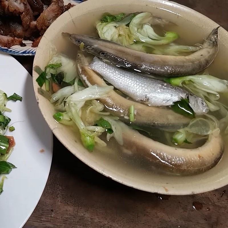 Step 4 Final Product Eel soup with edible flowers