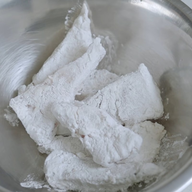 Step 3 Dredge and fry the fish Sweet and sour basa fish fillet