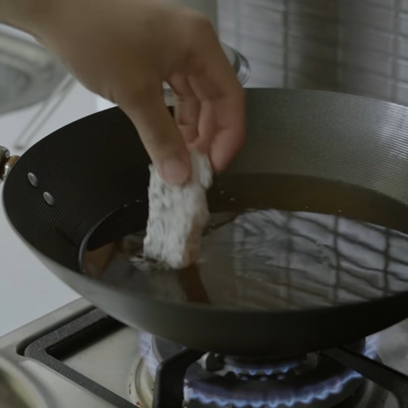 Step 3 Dredge and fry the fish Sweet and sour basa fish fillet