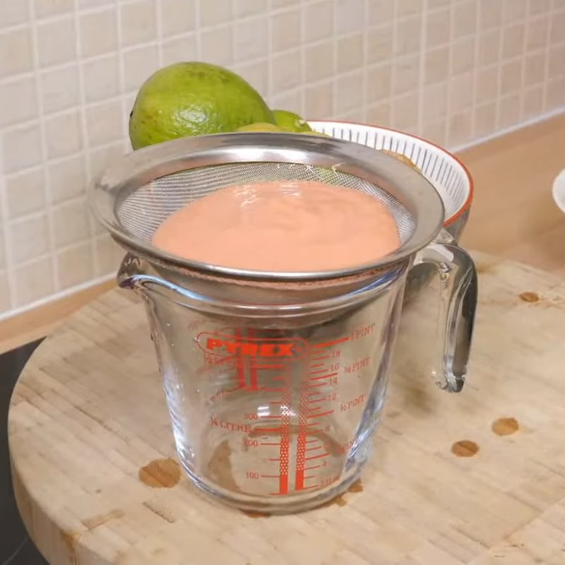 Step 3 Filtering guava lemon ginger juice Guava lemon ginger juice