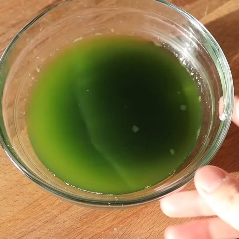 Step 3 Strain pandan leaf juice and gac fruit filling for Bánh ít