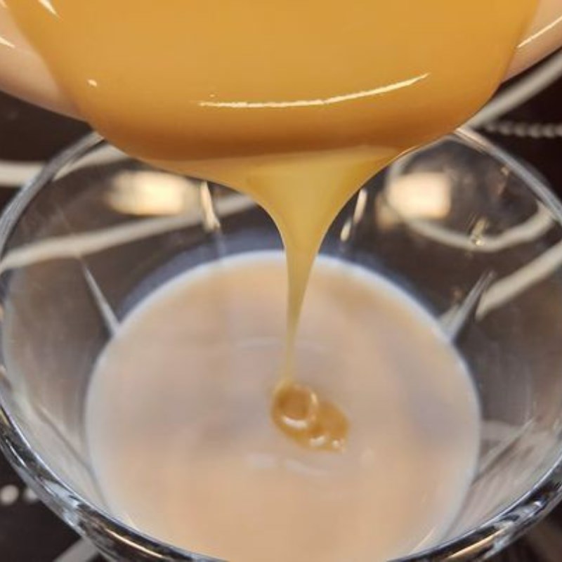 Step 2 Strain the tea and stir in the milk for macchiato black tea latte