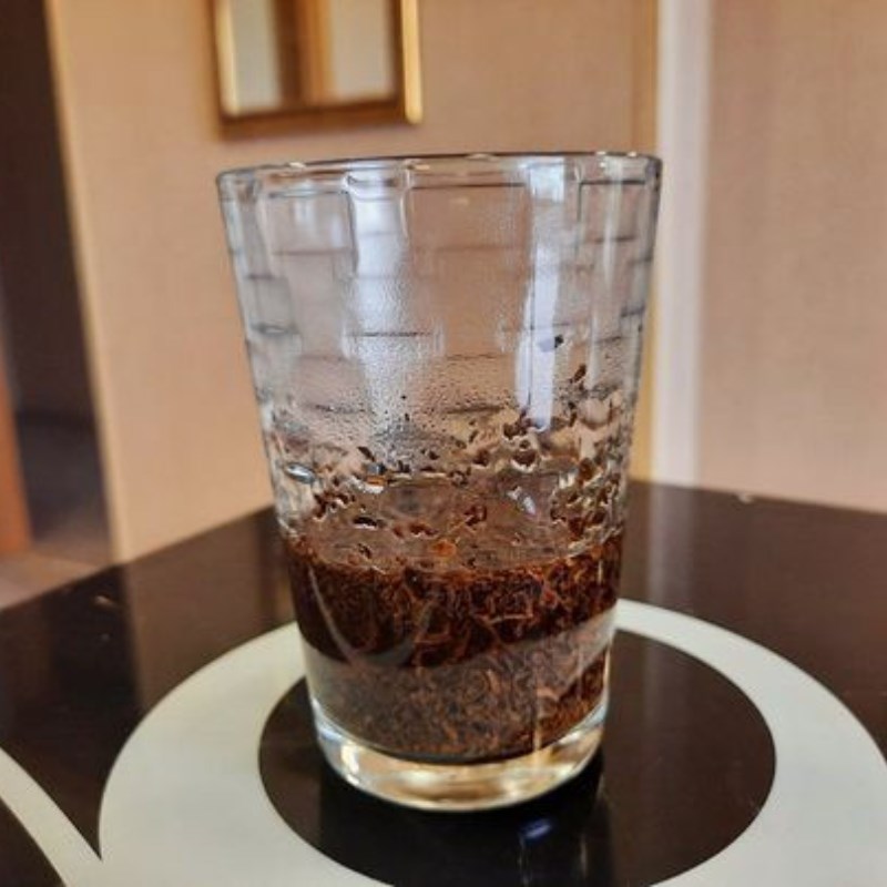 Step 2 Strain the tea and stir in the milk for macchiato black tea latte