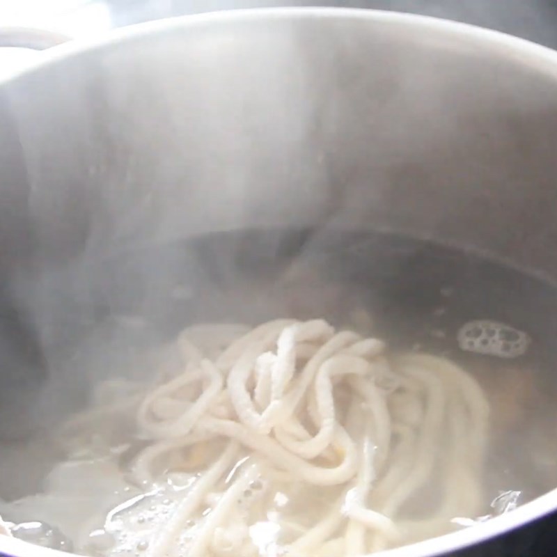 Step 7 Boiling the cake and completing Nghệ An Pork Bone Soup
