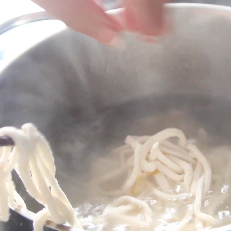 Step 7 Boiling the cake and completing Nghệ An Pork Bone Soup