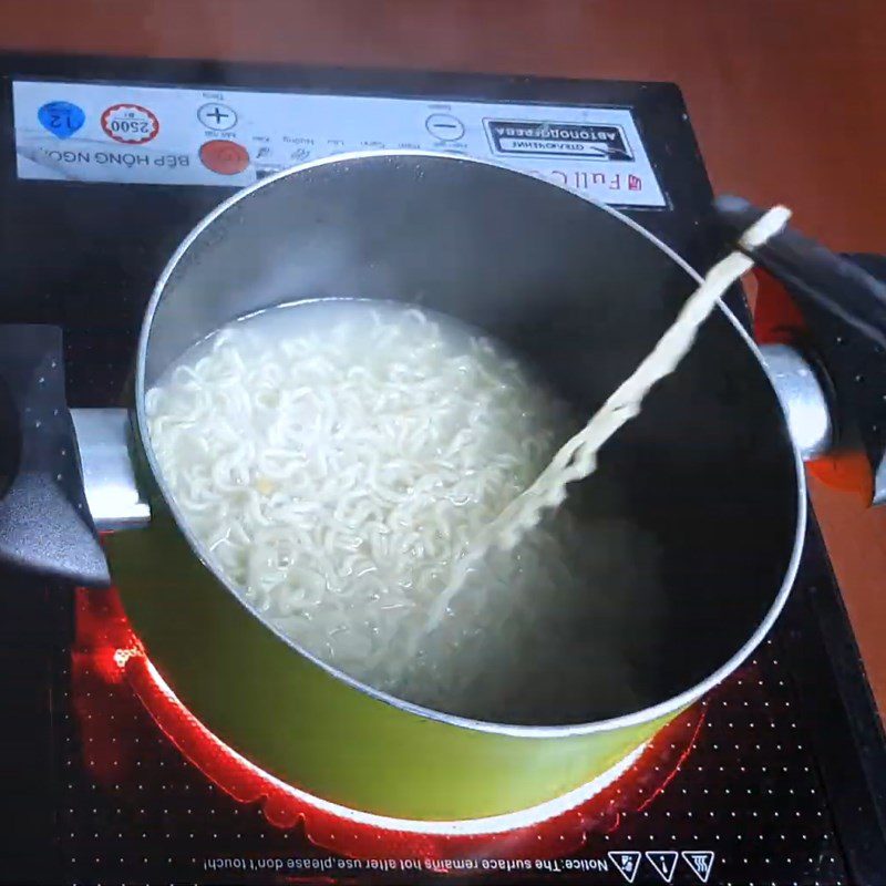 Step 2 Boil the ingredients Indomie mixed noodles