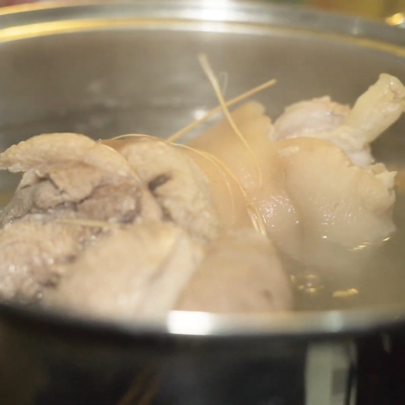 Step 2 Boil the pork leg Pork leg soaked in fish sauce