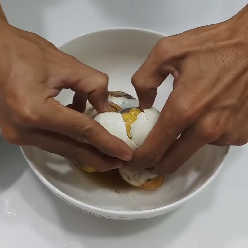 Step 2 Boil and peel the eggs Duck Egg Porridge with Mustard Greens