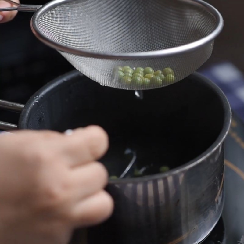 Step 2 Boil and shell the peas Salmon and Pea Porridge