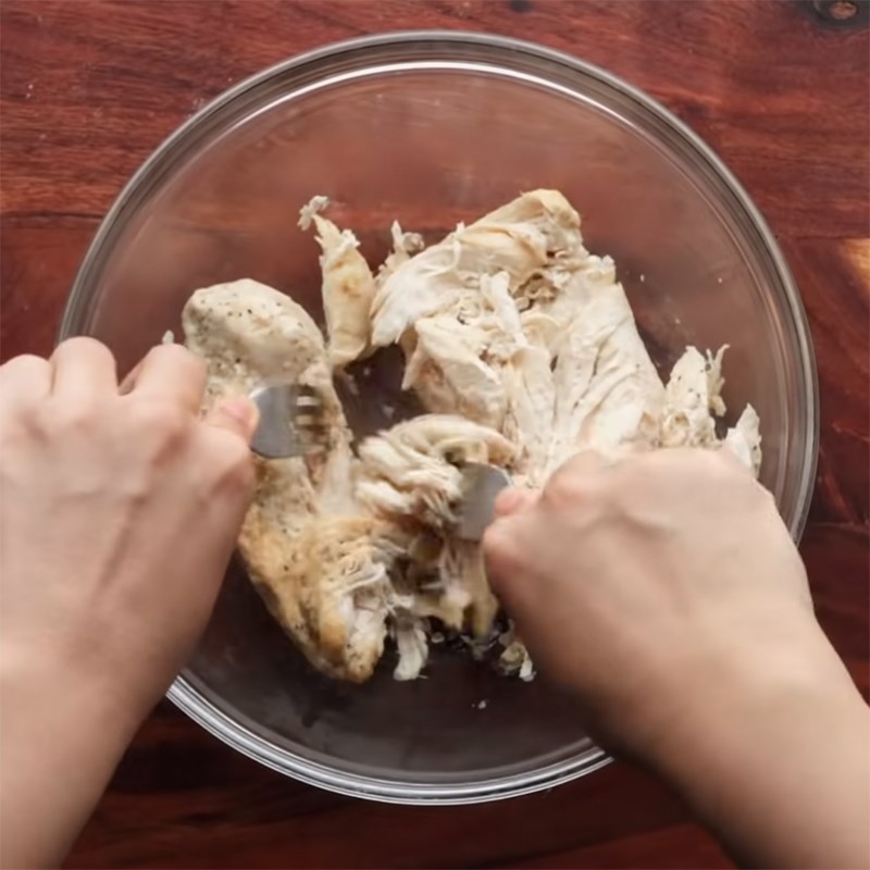 Step 2 Boil and shred the chicken breast for Chicken Bell Pepper Sandwich