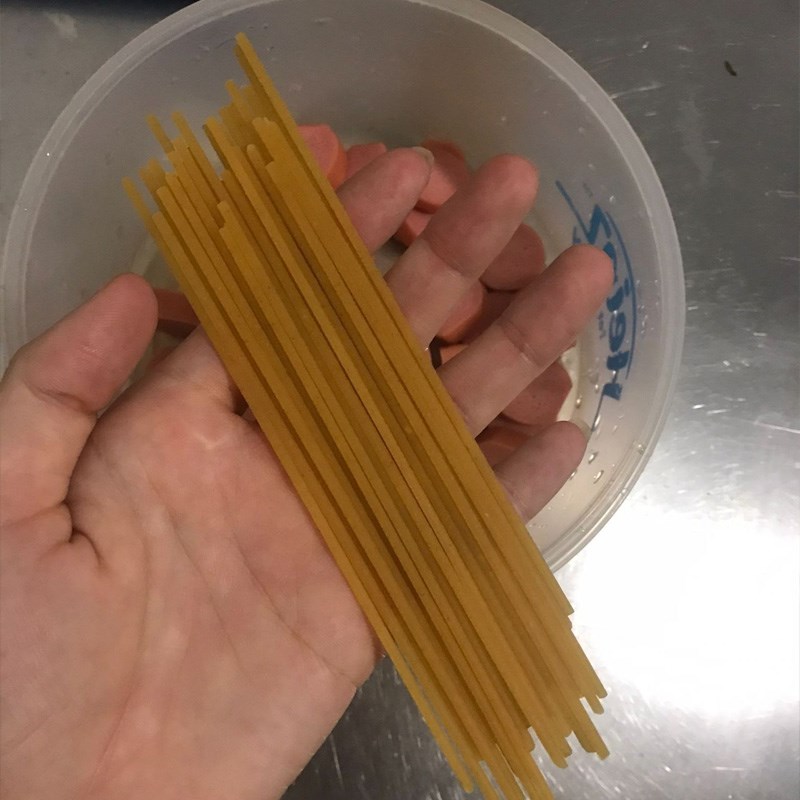 Step 2 Skewer spaghetti onto the sausage Spaghetti with sausage