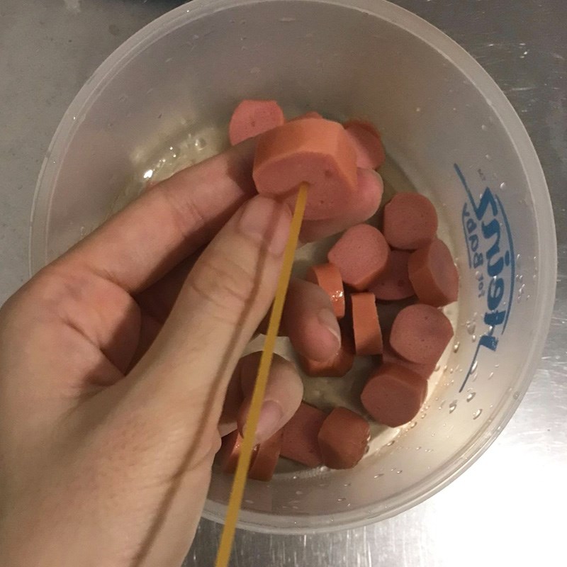 Step 2 Skewer spaghetti onto the sausage Spaghetti with sausage