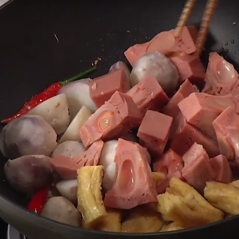 Step 2 Sautéing ingredients for young jackfruit stew with coconut milk