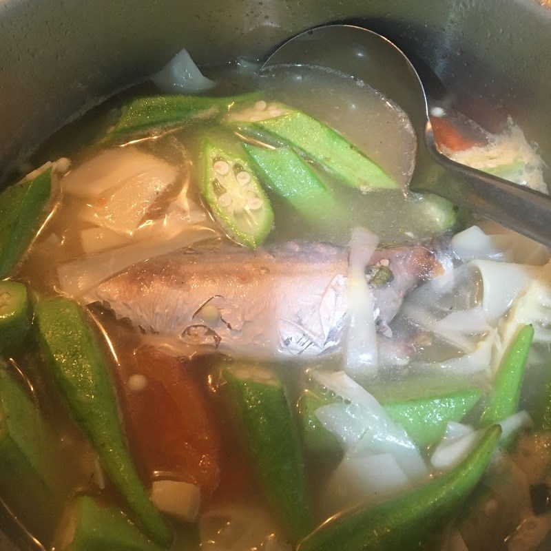 Step 3 Cook the soup Sour fish soup with bamboo shoots
