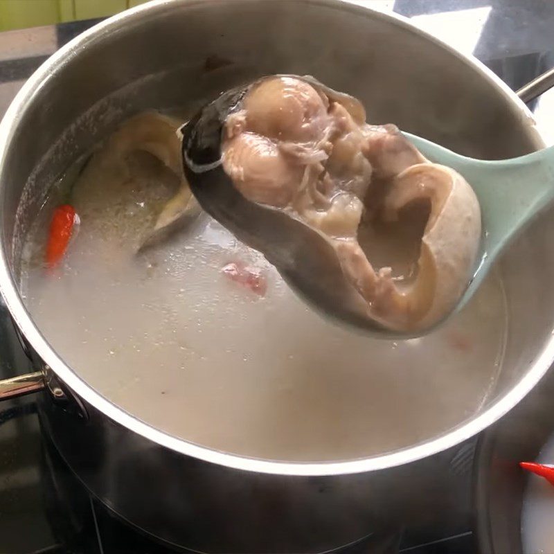 Step 5 Cooking basa fish soup with fermented rice