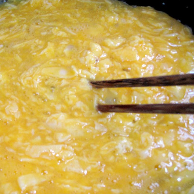 Step 2 Cook the porridge Chicken Egg Chao with Perilla
