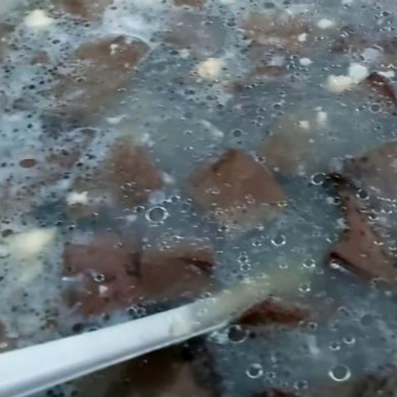 Step 4 Cooking porridge Blood porridge with minced meat