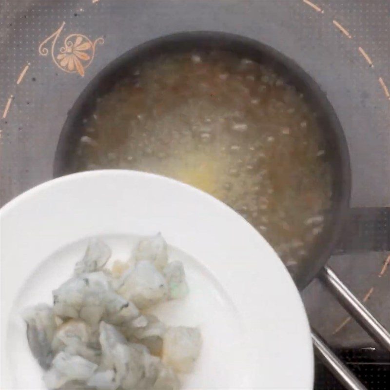 Step 4 Cook porridge Oatmeal porridge with shrimp and vegetables