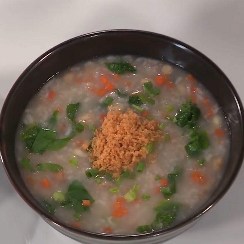Step 4 Cooking Porridge Salmon peanut porridge
