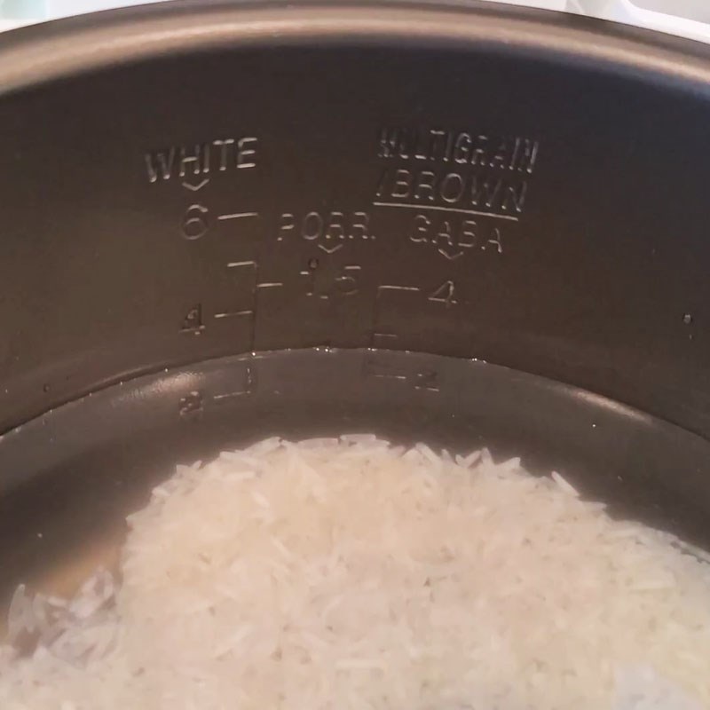 Step 2 Cook chicken porridge Chicken porridge cooked in Cuckoo rice cooker