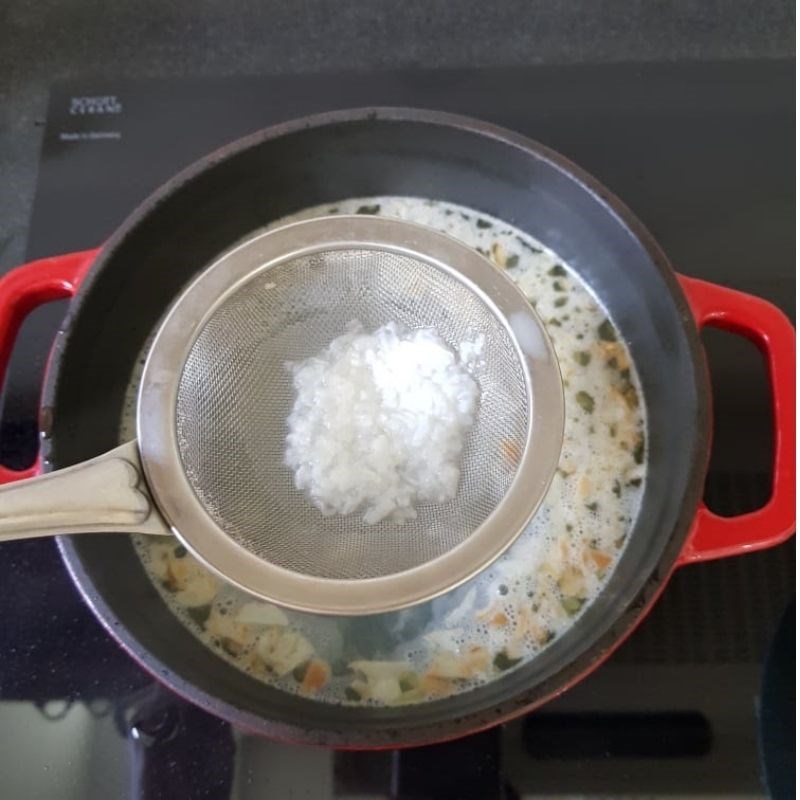 Step 3 Cooking goat meat in fermented rice