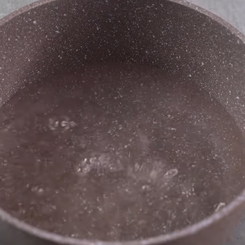 Step 2 Cook the mixture of sugar and orange juice Orange popsicle