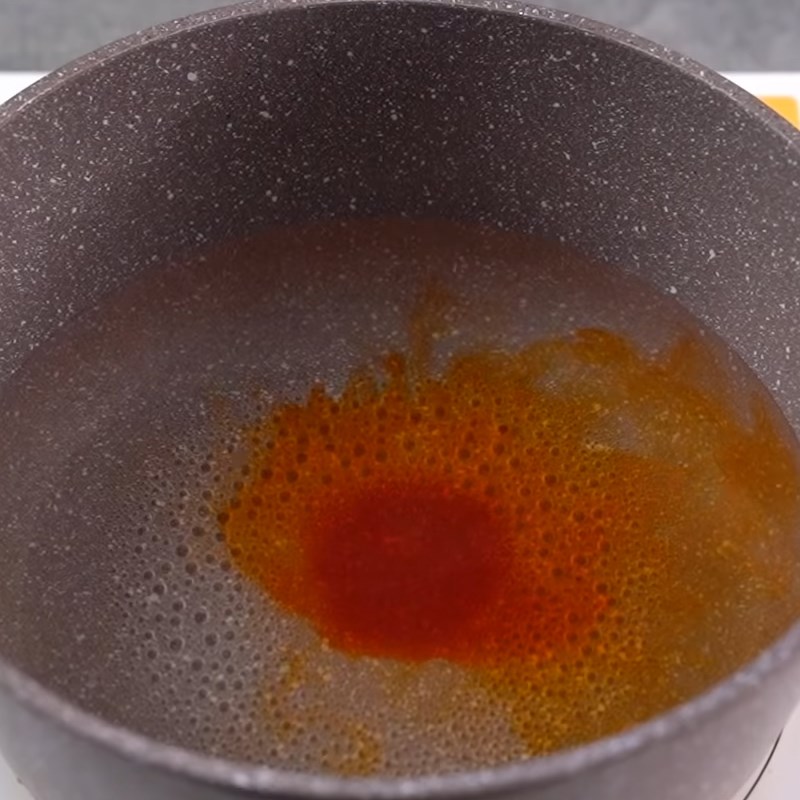 Step 2 Cook the mixture of sugar and orange juice Orange popsicle