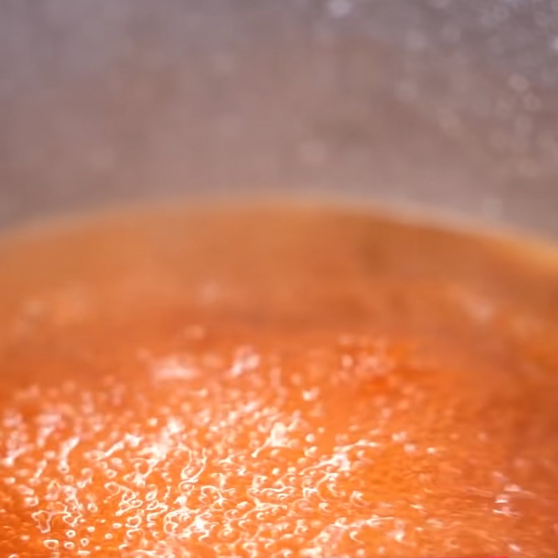 Step 2 Cook the mixture of sugar and orange juice Orange popsicle