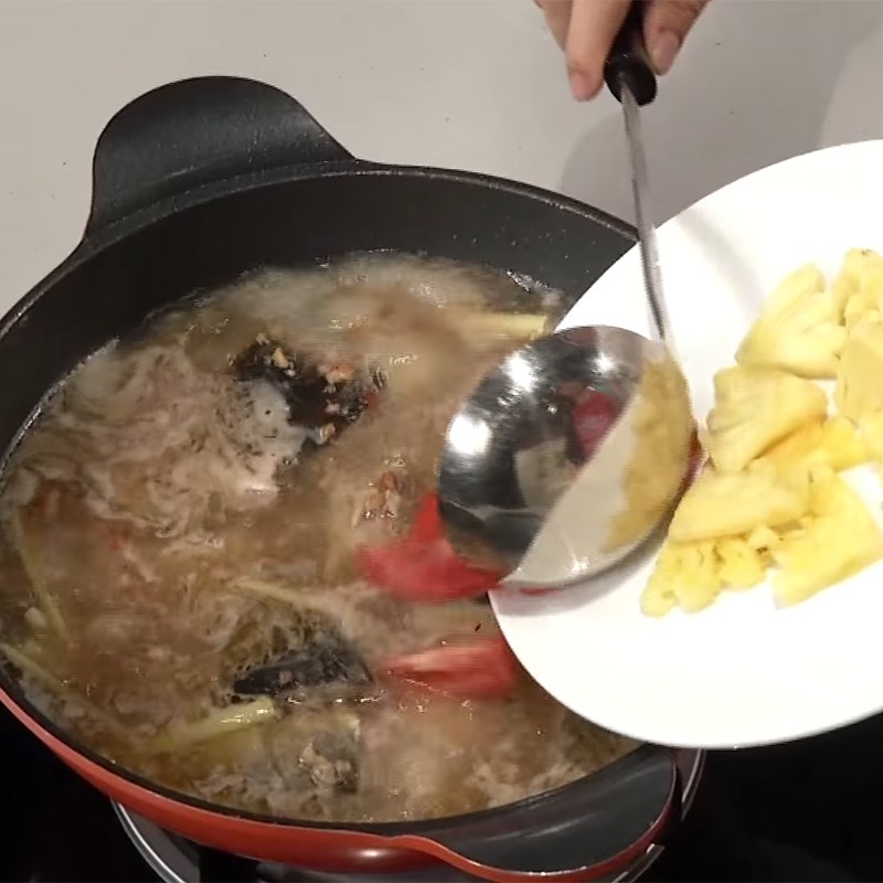 Step 5 Cook the hotpot Snakehead fish hotpot with Kèo nèo vegetables