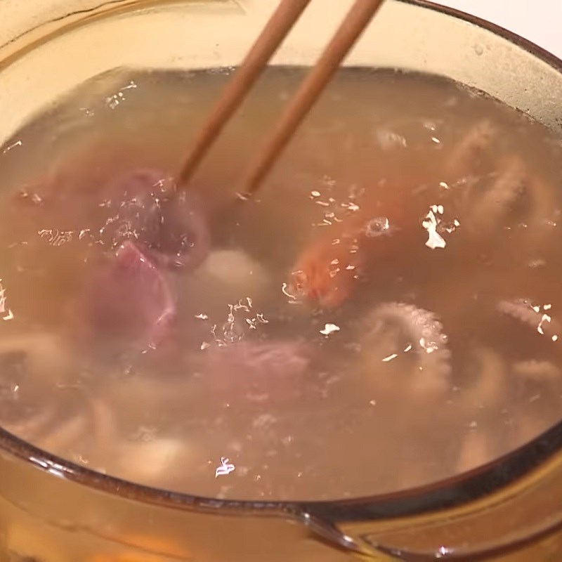 Step 4 Cooking hot pot Octopus hot pot with seafood
