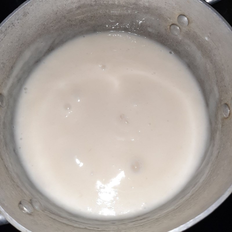 Step 2 Cook coconut milk and soak basil seeds Jelly with coconut milk (recipe shared by user)