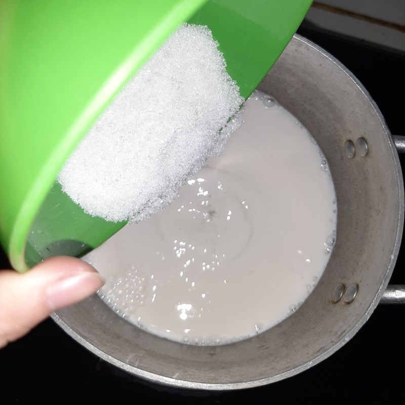 Step 2 Cook coconut milk and soak basil seeds Jelly with coconut milk (recipe shared by user)