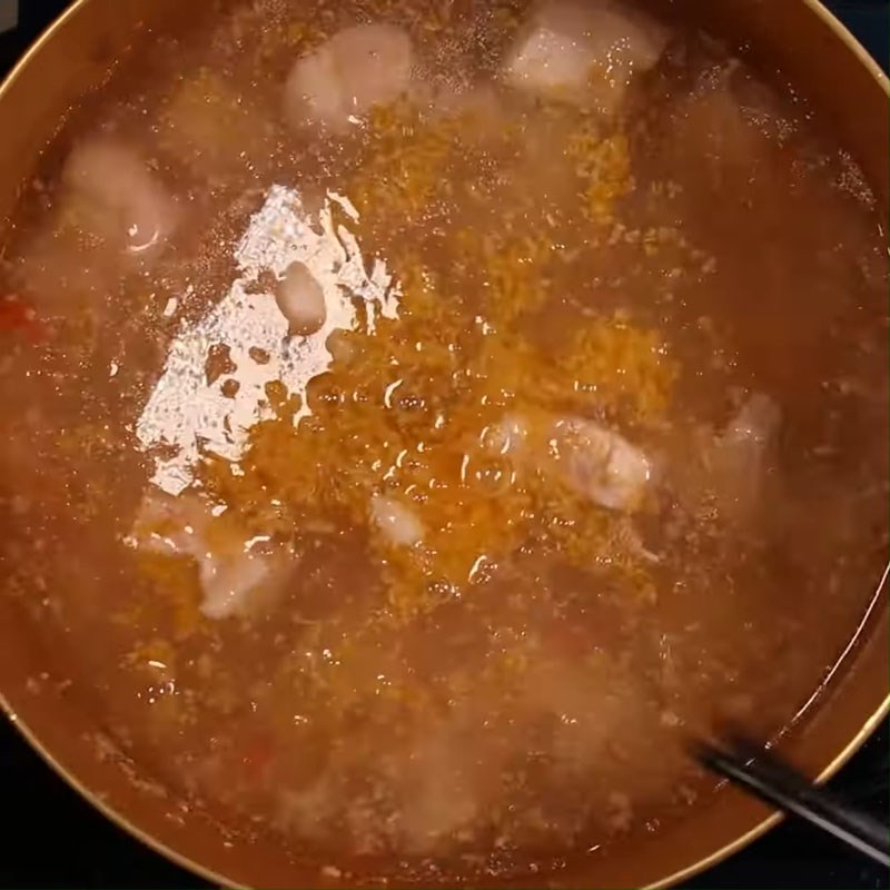 Step 4 Cook the broth for Mắm Ruốc Hotpot